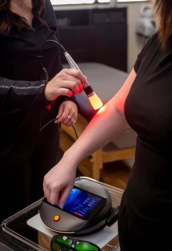 Class IV Laser in Progress on a Patient's Arm