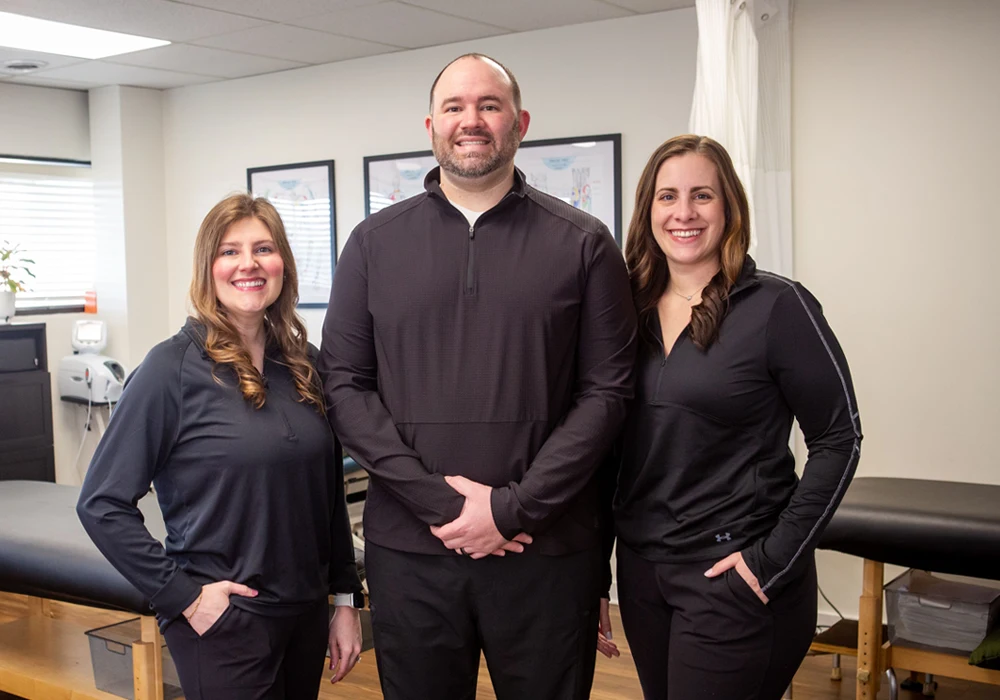 Hailey Alexander Cameron Beilke and Sarah Beilke Welcoming Patients To Clinic